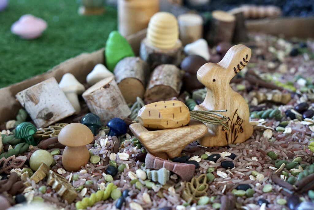 wood rabbit toy in sensory mix forest