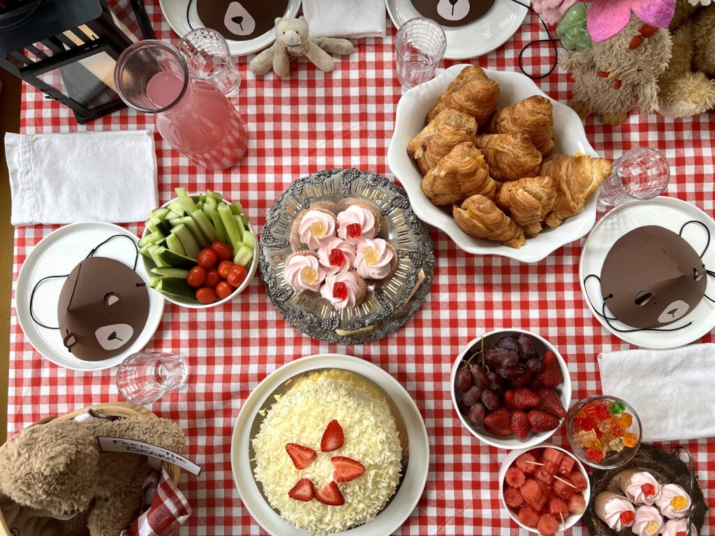 food and table setting at teddy bears' picnic dinner