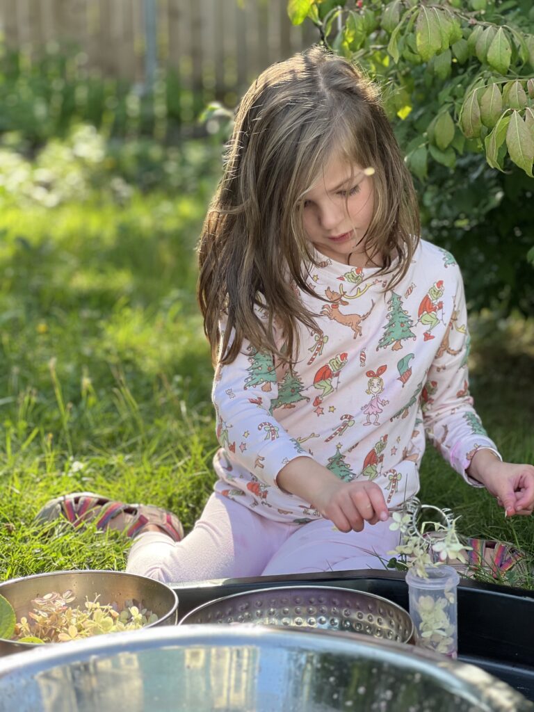 girl playing with nature fizzy potions