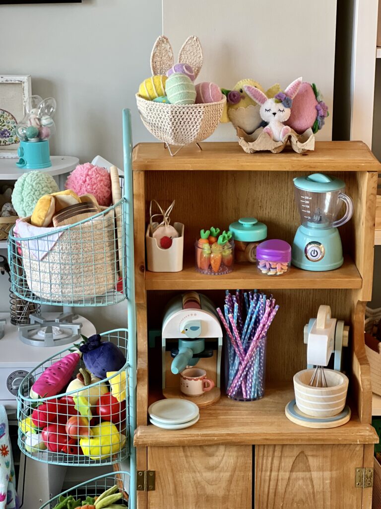 pretend play kitchen cupboard with easter decorations