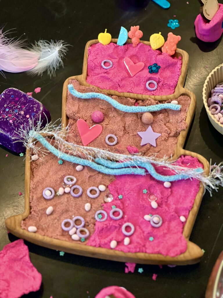 kinetic sand in cake wood sensory play tray