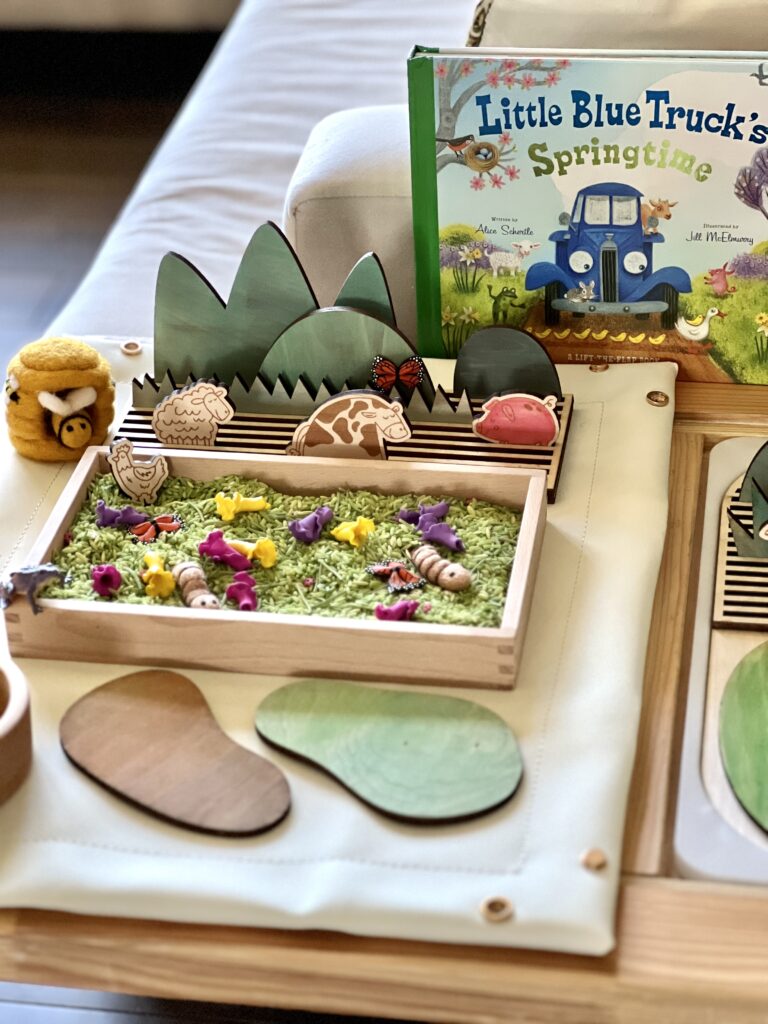 Sensory grass mix and little blue truck play pieces