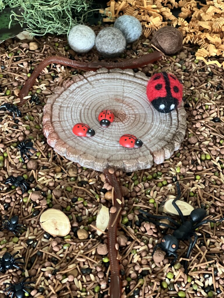 ladybugs on resin stump