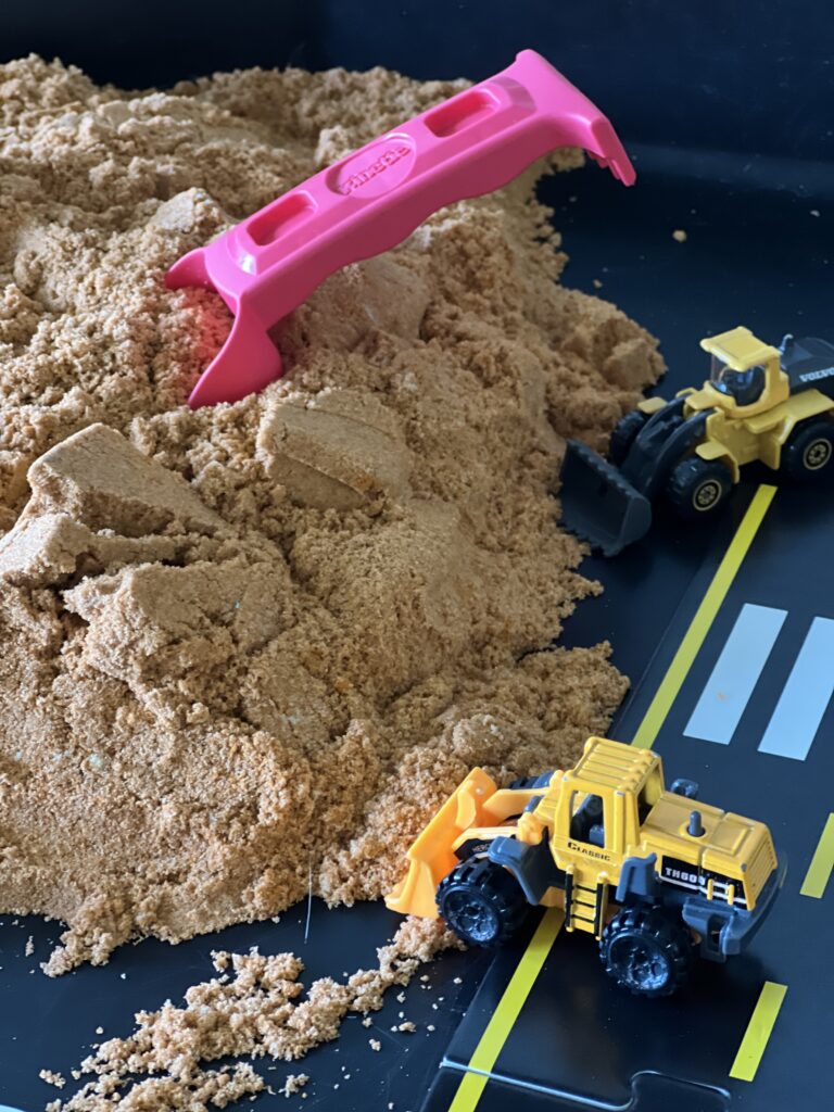 kinetic sand and construction vehicle toys