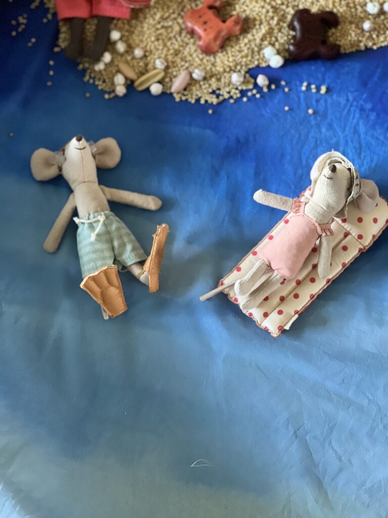 maileg mice swimming on play cloth