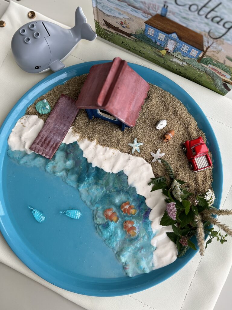 playdough, sand and water cottage play sensory tray