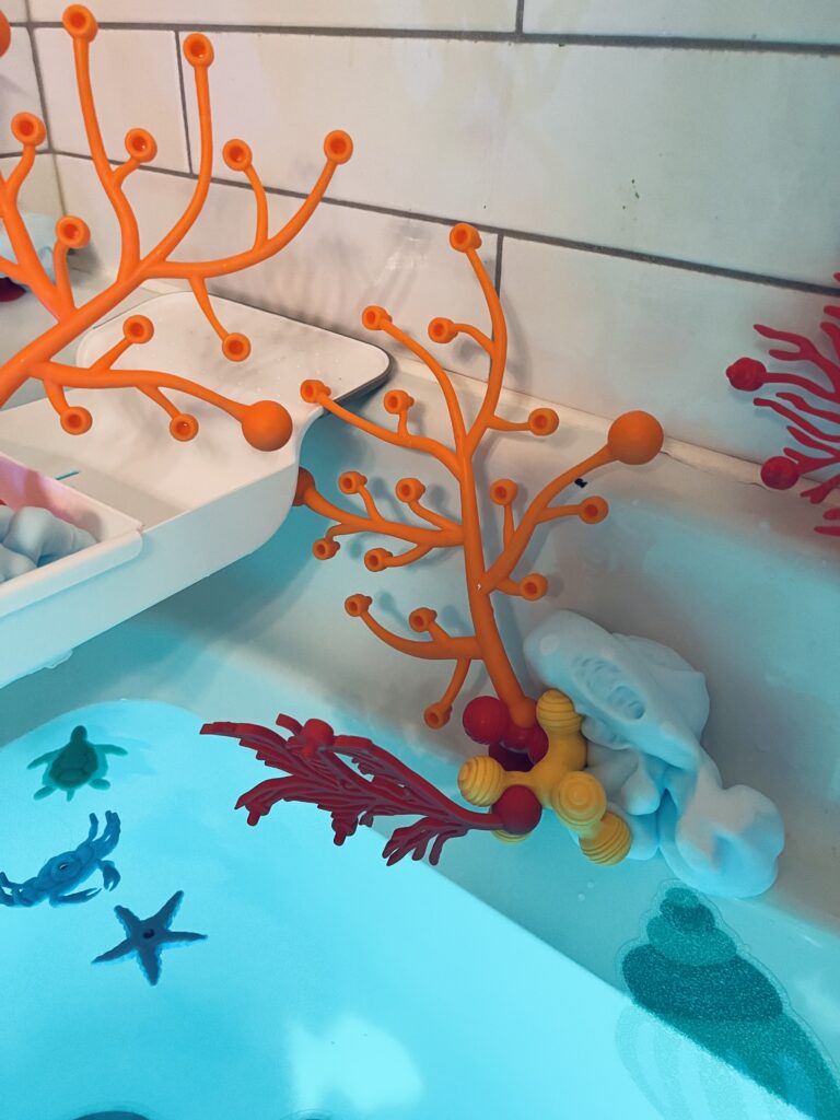 coral connection toys in the bath