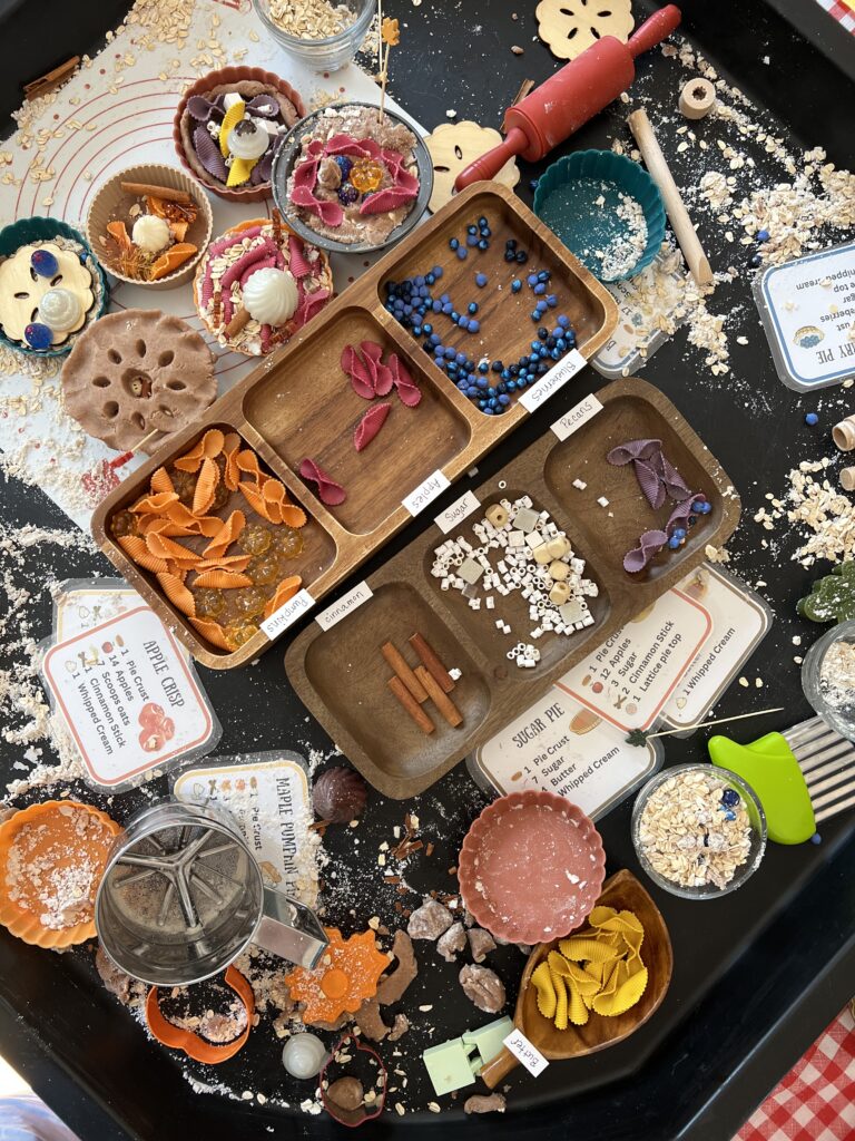 tuff tray containing play mess